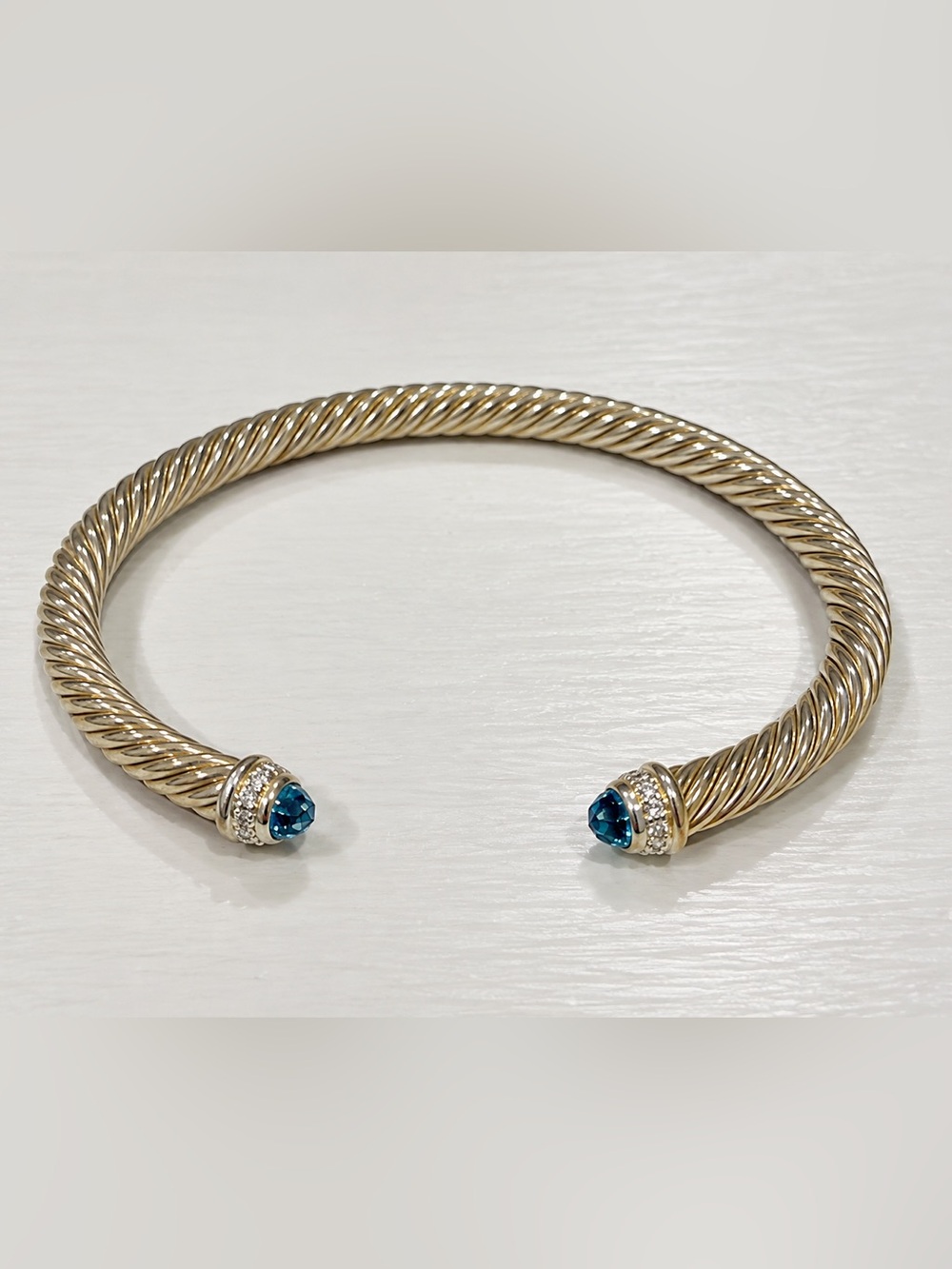 Sterling silver Twisted Cable Open Cuff Bracelet with Blue Crystal Ends